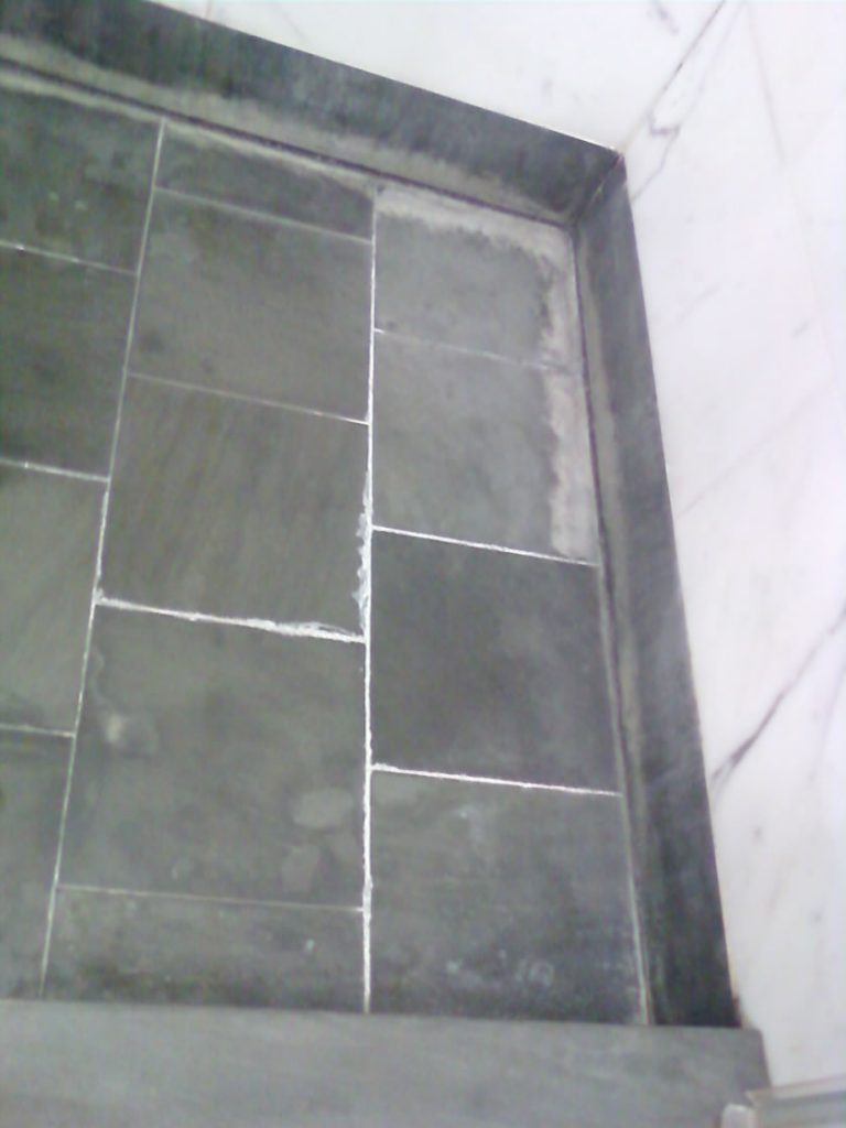marble-shower-floor-before