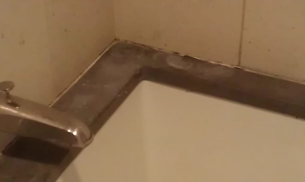 stained-bathtop-before