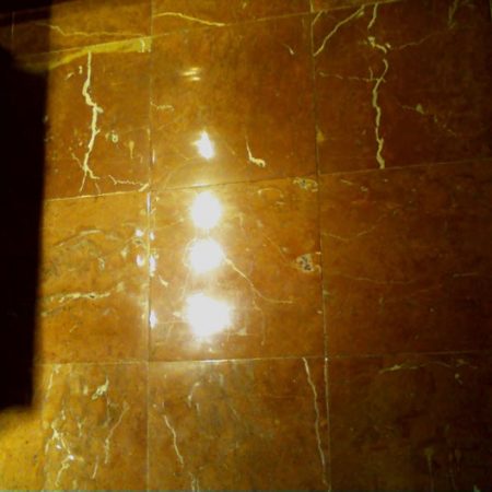 Brownish Polished Tiles on Bathroom Floor