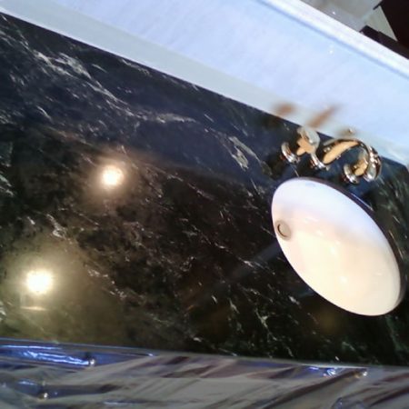 Etches and Clouds on Tarnished Serpentine Marble Vanity