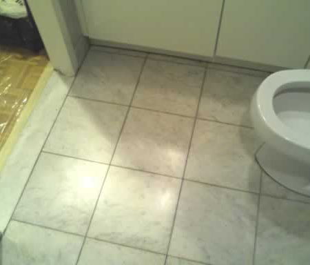 Dull White Marble Floor in the Bathroom