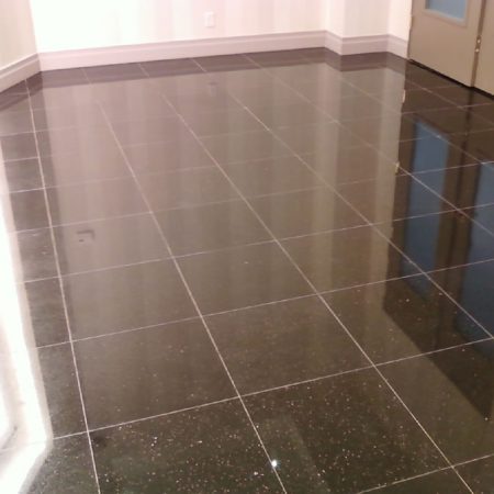 Pure Black Galaxy Granite. Wax Stripping