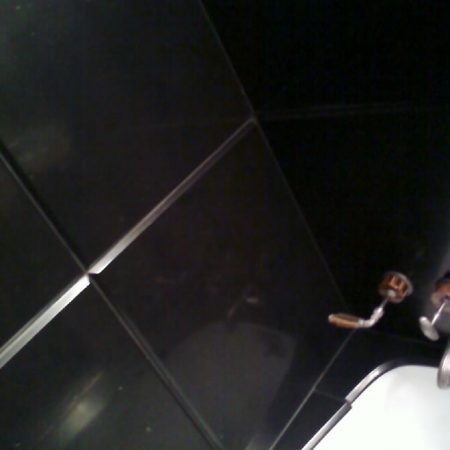black slite bathroom after jpg image Polished Slate Stone on Beveled Bathroom Walls
