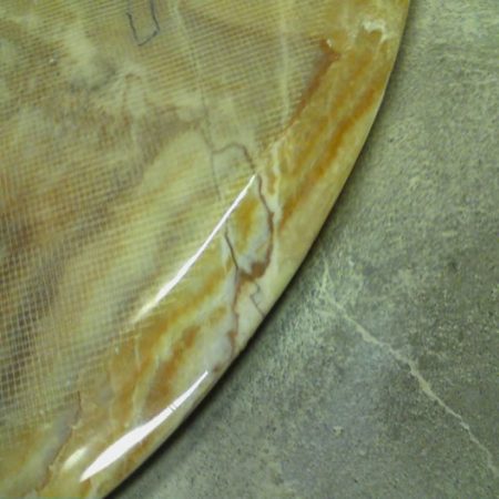 chip table edge repaired jpg image Fixed Ding on Onyx Dining Table Edge
