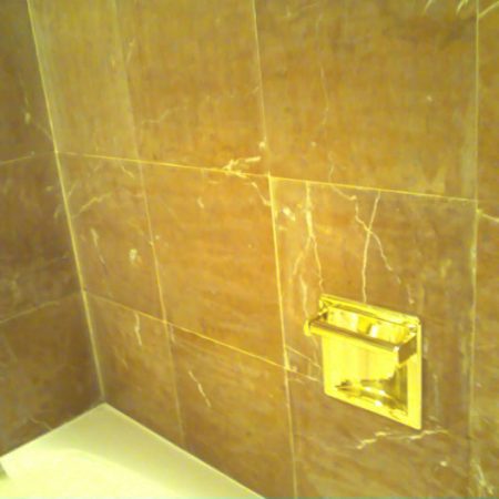 Discolored Haze Finish on Walls above Bathtub