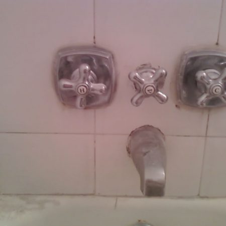 faucet recaulking before jpg image Bathroom Faucets Before Re Caulking with Old Silicone
