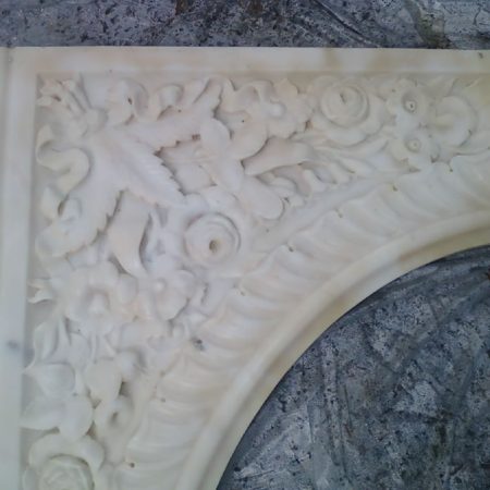 Stains on Intricate Carved Flowers on Fireplace Pillar