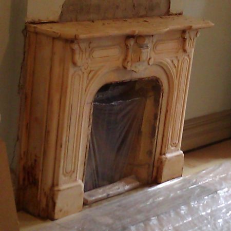 Aged Marble Parlor Fireplace in Brooklyn