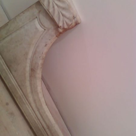 fireplace surround before jpg image Dingy Marble Fireplace Surroundings Restoration