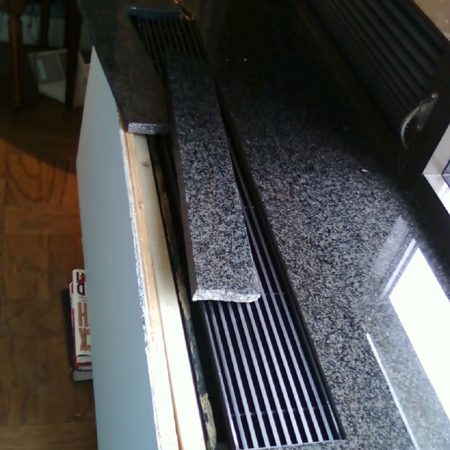 Buckling Radiator Granite Sill. Broken Off Parts