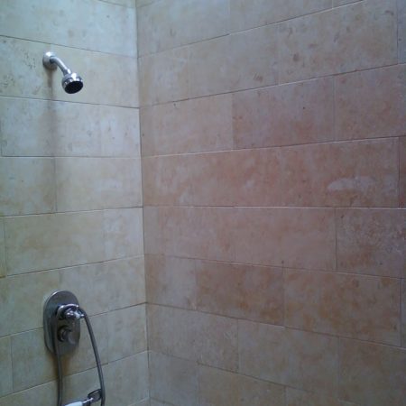 jerusalem stone color enhacement before image Jerusalem Stone on Shower Walls. Before Sealing