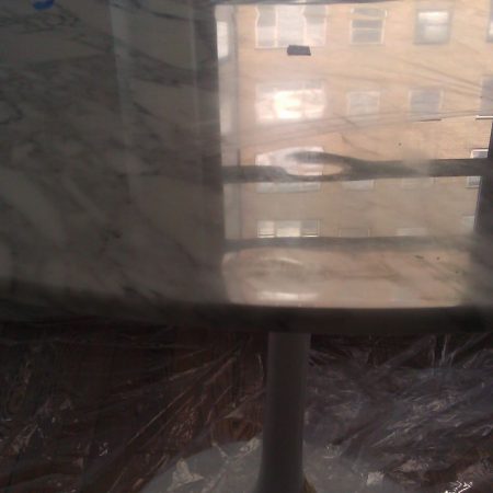 marble table gap before image Waves and Cavity on Table Surface Removal