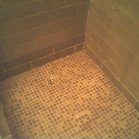 Limestone Mosaic Shower Floor after Full Restoration