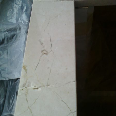 radiator sill before image Tension Crack & Seam Repair on Crema Marfil Radiator Sill