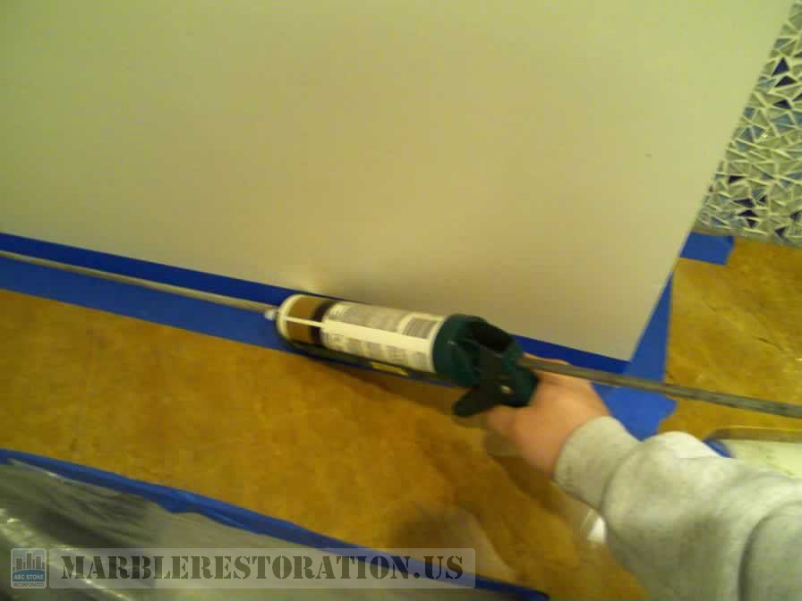 Caulking on PreTaped Corner ABC Stone Inc.