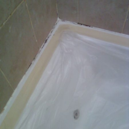 Mildew on Tub Caulk Before Re-Caulking