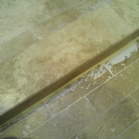 Shower Threshold Beveled and Sanded Onsite