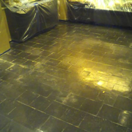 Wax Flaking off on Slatestone Floor before Grinding & Polishing