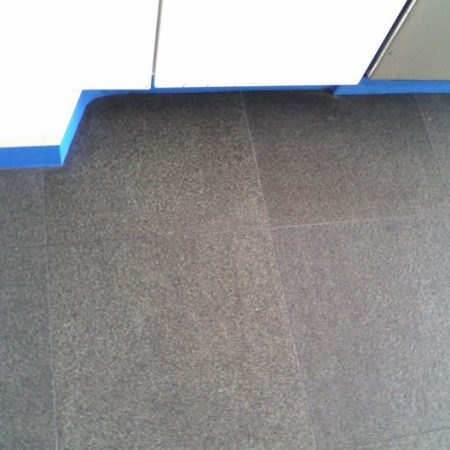 Gray Granite with Flamed Finish after Oily Spills Removal