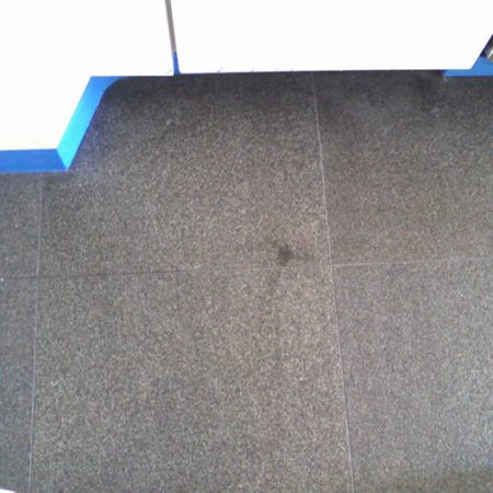 Oily Specks on Flamed Granite Floor