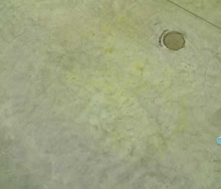 Unknown Yellow Smears on Concrete Floor