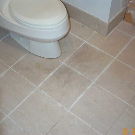 Soiled Floor in Bathroom Old Grout Removed