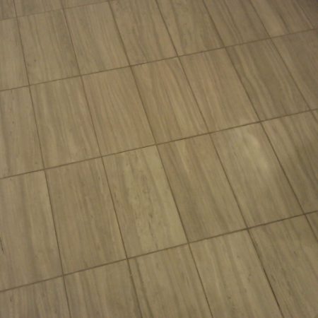 Rectangular Tiles on Bathroom Floor before Restoration