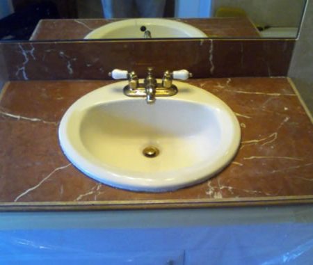 Tarnished Tiled Vanity Before the Repair. Rojo Alicante