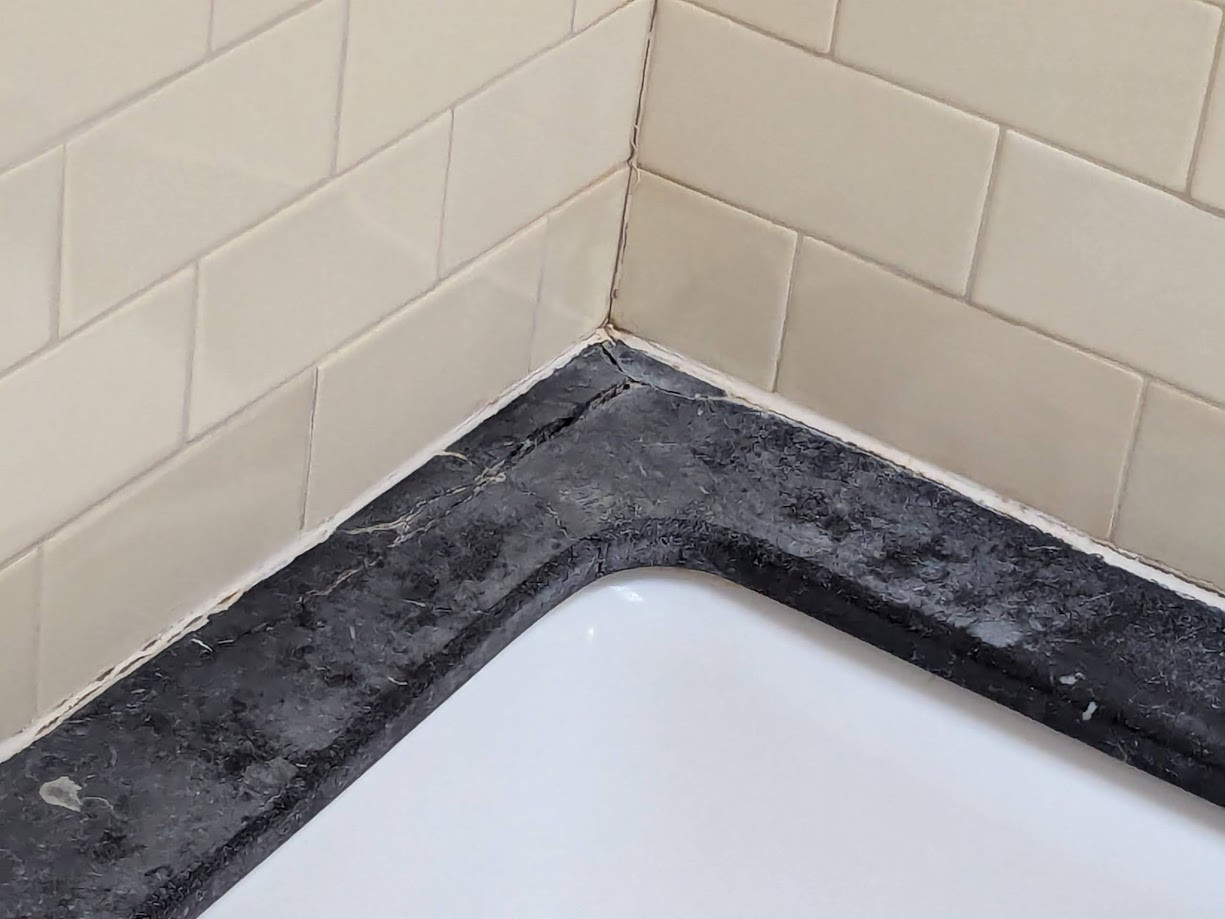 Cracked Marble Tub Top/Bad Caulk