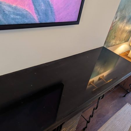 fireplace top shelf etch buffed out image Mantel Top Restored: A Glossy, Like-New Transformation