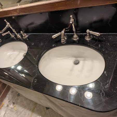 polished double sink black vanity image Polished Caulked Double Sink Vanity