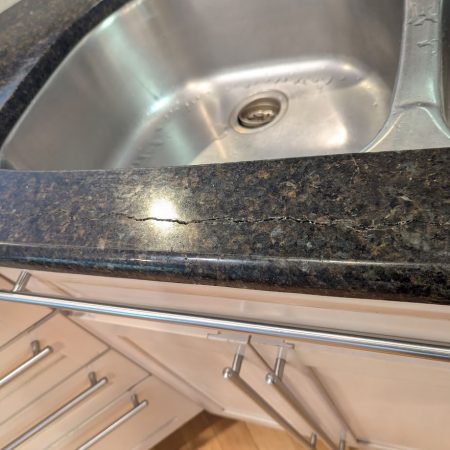 Crack in Front of Sink in Ubatuba Granite Countertop