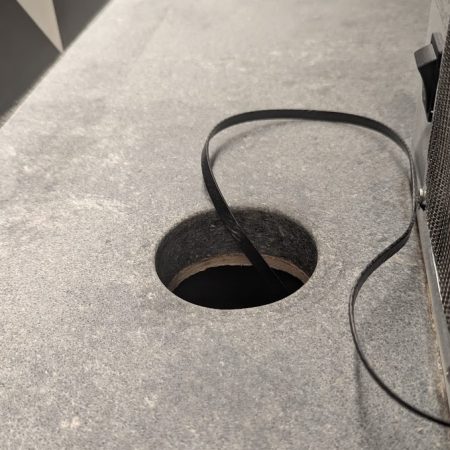 porcelain countertop hole enlarged 3 inch airflow drilling complete nyc office image Porcelain Countertop Hole Enlarged to 3 Inches, NYC
