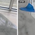 Before and after of a chipped clear coat on a white marble Saarinen table, side by side