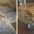 Emperador Dark marble table top with a peeling resin coating partly scraped off, next to the same top after a new clear coat