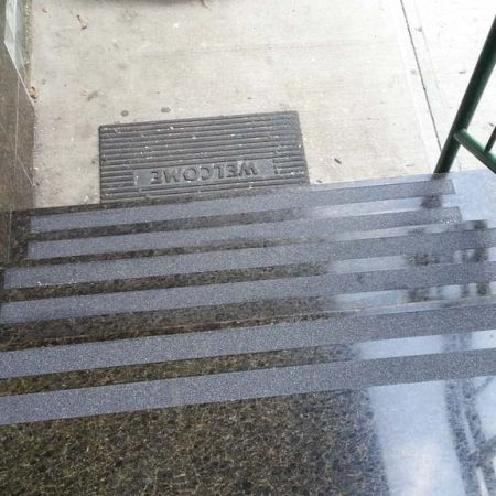 Non-Skid Tape Installation on Granite Steps (Ubatuba Granite)