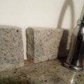 Beige Granite Backsplash Split Into Two