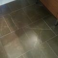 Brown Bathroom Floor Worn Finish