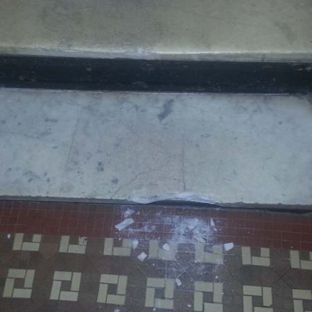 Severely Chipped Nosing on Marble Step
