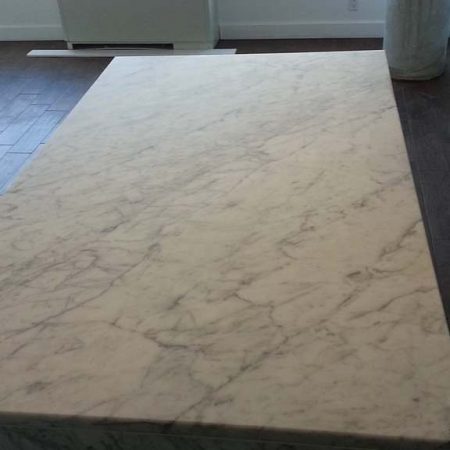 Eggshell or Matte Finish on White Carrara Island Top