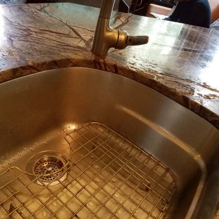 Water Erosion on Countertop (Rainforest Brown Marble)