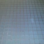 Glass Mosaic Bathroom Floor Before Grout Cleaning