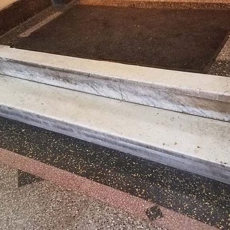 Grime on Marble Steps in Foyer