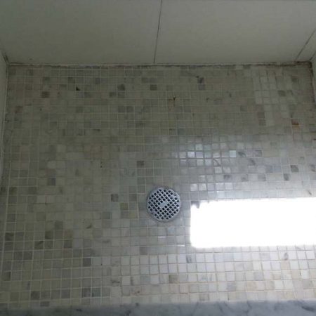Mosaic Shower Floor before Cleaning