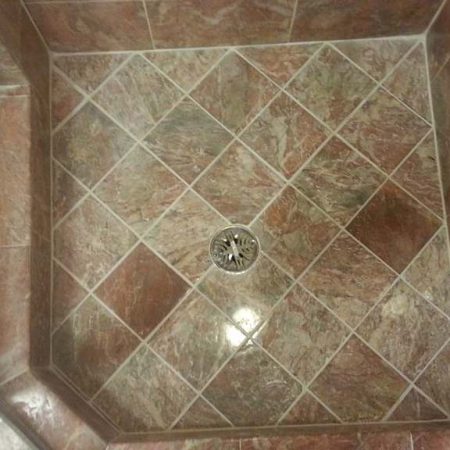 Polished & Patched Floor in Shower Stall