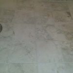 Shower Floor Buildup Removed And Regrouted