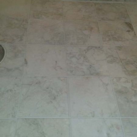 Grout Buildup Removed and Regrouted