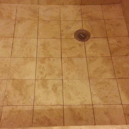 Old Grout Deep Cut Out Lines on Shower Stall Floor