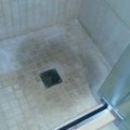 Stained Limestone Shower Mosaic Floor
