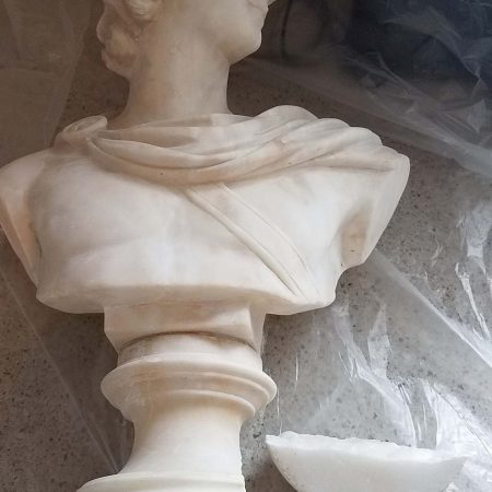 Split Statue Base of Greek Face Bust